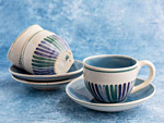 Pottery cups and saucers by Dorothy Watson
